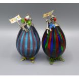 A Pair of Silver Mounted Morano Glass Clowns 'Salt and Pepper' with enamel decorated silver heads