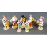 A Group of Five German Porcelain Figures together with a similar smaller pair of German porcelain