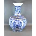 A Chinese Underglaze Blue Decorated Bottleneck Vase, blue seal mark to base, 55 cms tall
