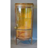 A French Vernis Martin Style Gilt Metal Mounted Corner Vitrine the bow door enclosing shelves raised