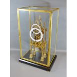 A 20th Century Cathedral Brass Skeleton Clock the enamel dial with roman numerals and subsidiary
