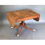 A Regency Mahogany Sofa Table, the two frieze drawers above a turned centre column, outswept legs