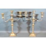 A Pair of Silver Plated Three Branch Candelabrum in the Adams Style, 35 cms tall