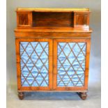A William IV Rosewood Chiffonier, the superstructure with brass gallery, the lower section with