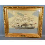 A Regency Wool Work Sailors Picture depicting a three masted sailing ship, 41 x 51 cms