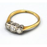 An 18ct Gold and Platinum Three Stone Diamond Ring