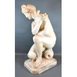 A 19th Century Marble Sculpture of The Crouching Venus with marble plinth, 62 cms tall
