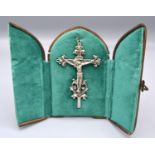 A Continental White Metal Crucifix within a Folding Case 11 cms long