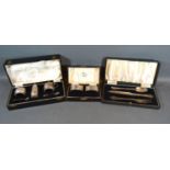 A Birmingham Silver Three Piece Condiment Set within fitted case together with a pair of