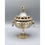 A Victorian Silver Pedestal Covered Pot Pourri, the pierced figural cover with lion ring handles and