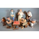 A Collection of Various French Plaster Figures and a pair of wooden figures