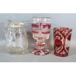 A Bohemian Ruby Glass Beaker together with a similar Goblet and a clear glass lidded Tankard