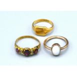 An 18ct. Gold Signet Ring, 3.4 gms. together with two dress rings