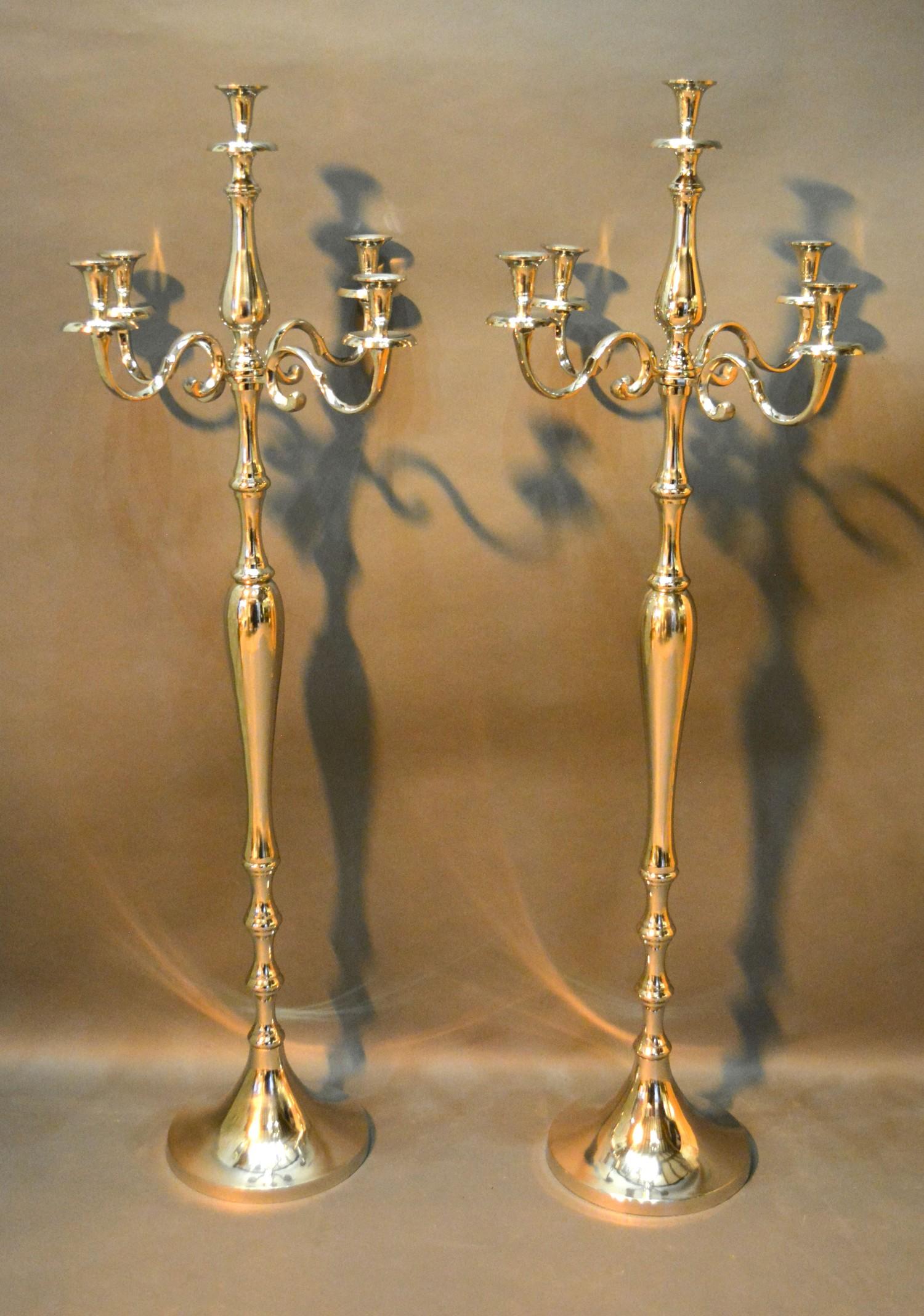 A Pair of Floor Standing Chromium Five Branch Candelabrum with circular bases, 149 cms tall