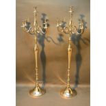 A Pair of Floor Standing Chromium Five Branch Candelabrum with circular bases, 149 cms tall