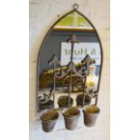 A Weathered Metal Mirror with shaped form above three small planters 82cm by 45cm
