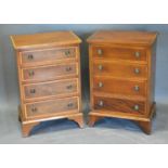 A Pair of Edwardian Mahogany Satinwood Inlaid Bedside Chests of four drawers with circular brass