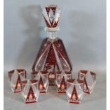 A Bohemian Ruby and Clear Glass Drinking Set comprising Decanter with stopper and six small Glasses