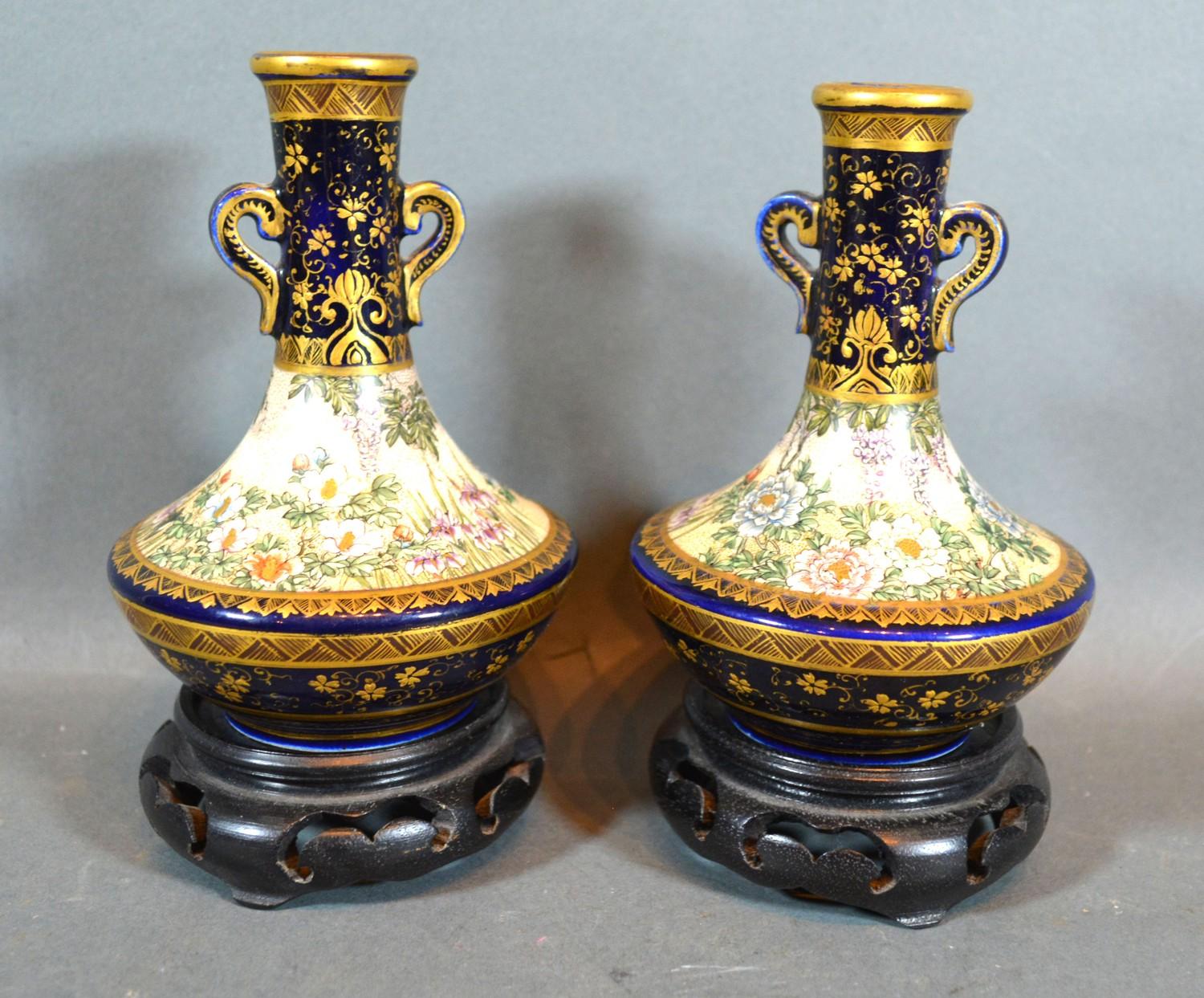 A Pair of Late 19th or Early 20th Century Satsuma Earthenware Two Handled Bottleneck Vases each