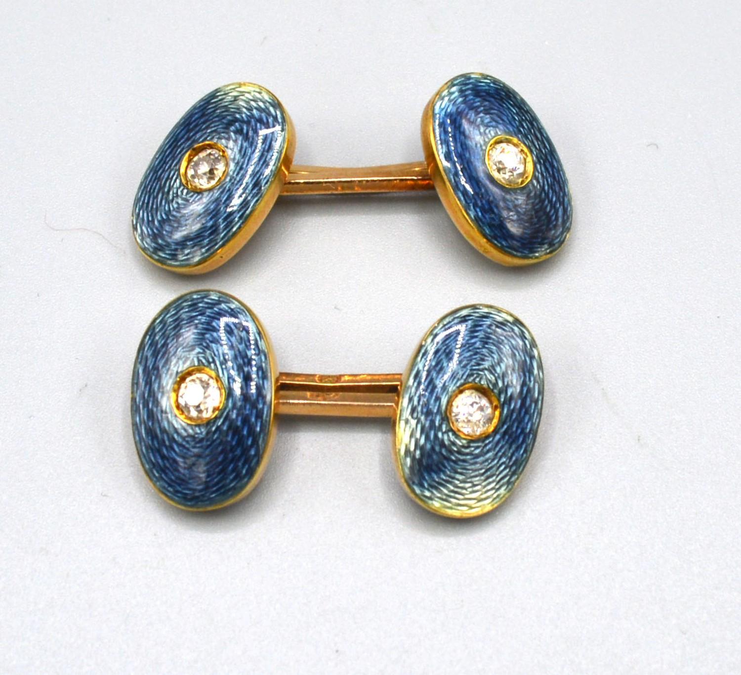 A Pair of Russian 56 Mark Gold Cufflinks each inset a diamond within enamel, 11.67 gms
