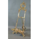 A French Style Brass Picture Easel of pierced scroll form 50cm tall