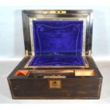 A 19th Century Coromandel Fold Over Writing Box, the hinged top enclosing a fitted interior