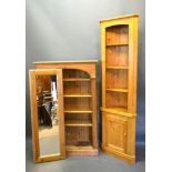 A Pine Bookcase with a moulded cornice above open shelves raised upon a plinth, 99 cms wide, 31