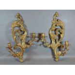 A Pair of French Patinated Bronze Wall Sconces of shaped scroll form 49cm long