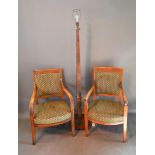 A 19th Century French Armchair together with another similar and an Art Deco walnut lamp standard