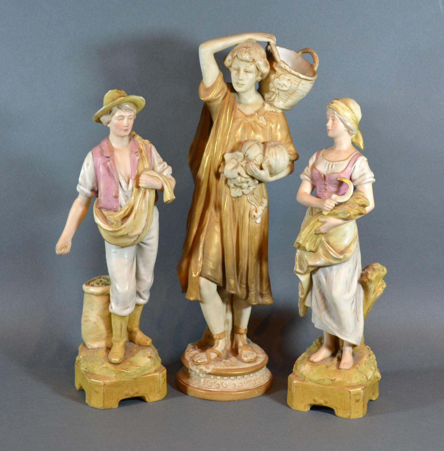 A Royal Dux Figure in the form of a Classical Female carrying a Basket, 37 cms tall together with