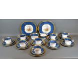 A Fenton Porcelain Tea Service comprising nine cups and saucers, nine plates, a pair of dishes,