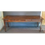 A 19th Century French Oak Farmhouse Refectory Style Dining Table, the plank top above two frieze