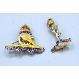 A 9ct. Gold Brooch in the form of a Royal Artillery Cap Badge with enamel decoration together with
