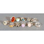 A Collection of Eleven Silver Dress Rings set various stones