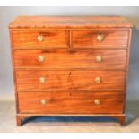 A 19th Century Mahogany Straight Front Chest of Two Short and Three Long Drawers with circular brass