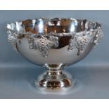 A Silver Plated Punch Bowl decorated with grape vine upon a circular pedestal base 38cm diameter