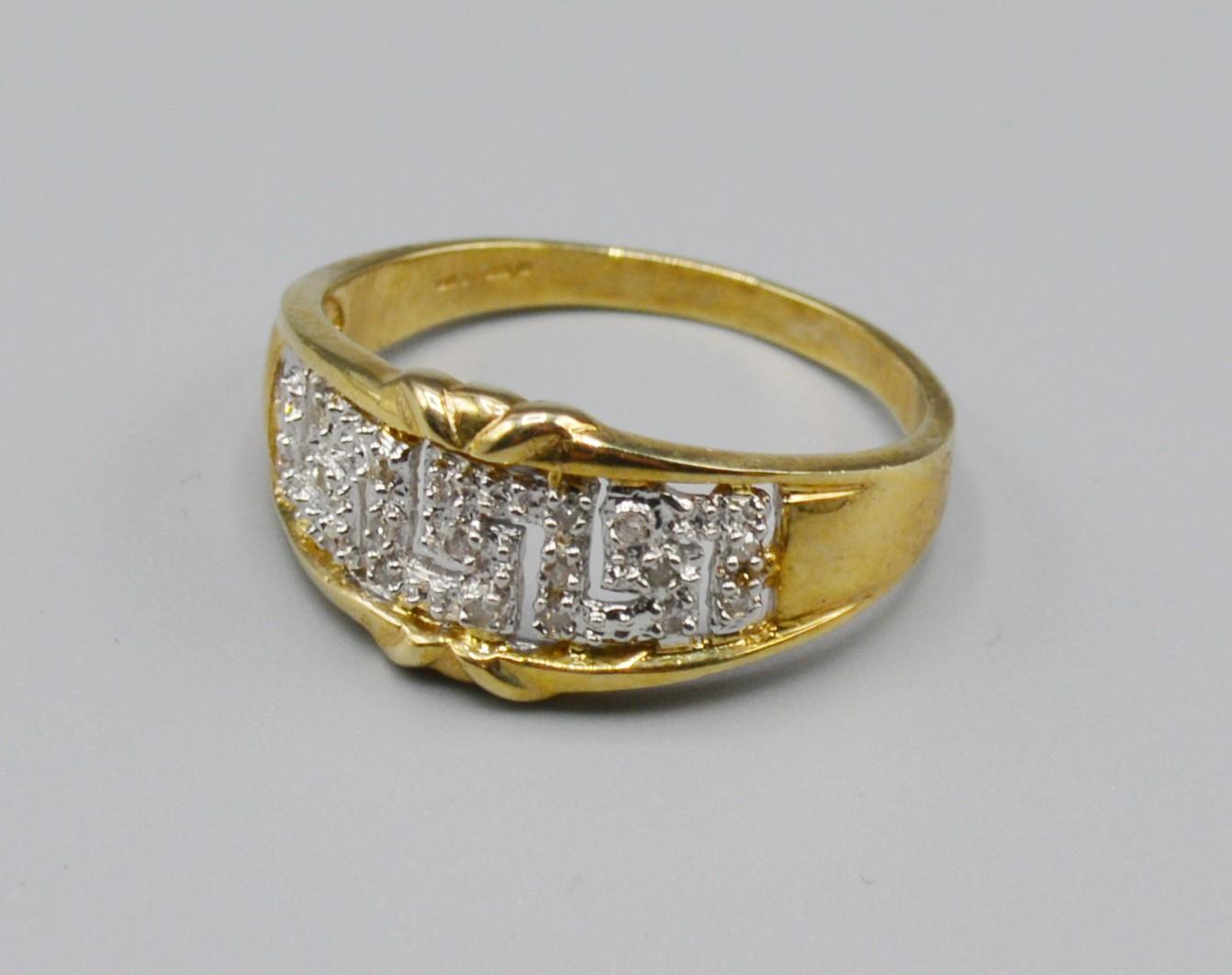 A 9ct Gold Diamond Band Ring of Pierced Form, 4 grams, ring size T