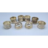 A Set of Six Chester Silver Napkin Rings together with a pair of Birmingham silver napkin rings, 5