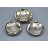 A London Silver Coin Inset Bowl together with two other Sterling silver coin inset bowls