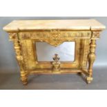 A French Style Gilded Console Table, the simulated marble top above a carved mask head frieze raised