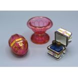 A 19th Century Venetian Ruby Glass Scent Bottle in the form of an Egg with associated stand together