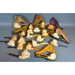 A collection of Meerschaum Pipes, some within original cases