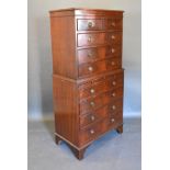 A Reproduction Mahogany Chest on Chest, the top section with moulded top and two short and three