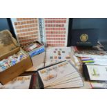 A Collection of Stamps in Albums and Loose to include British and Foreign, mint and used together