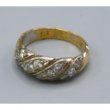 An 18ct Gold Diamond Cluster Ring of banded form, 4.6 gms, ring size L