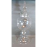 A Large Glass Covered Vase of Oviform with circular pedestal base, 77 cms tall
