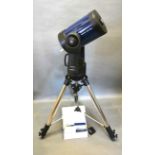 A Meade LX90 EMC Telescope with stainless steel tripod and accessories