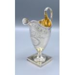 A George III Silver Helmet Shaped Cream Jug with square pedestal base, London 1796, makers Peter and