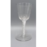 An Early Wine Glass with ribbed bowl above a cotton twist stem and circular foot, 15 cms tall