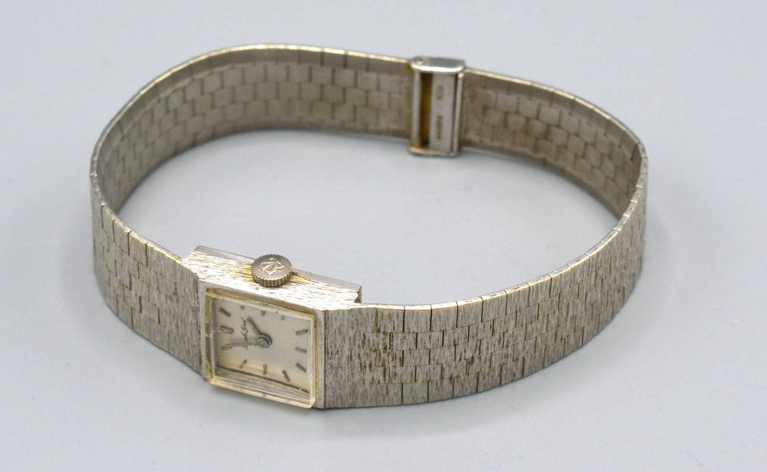 A Beuche Girod 9ct. White Gold Cased Ladies Wristwatch with 9ct. White Gold Strap, 32.4 gms
